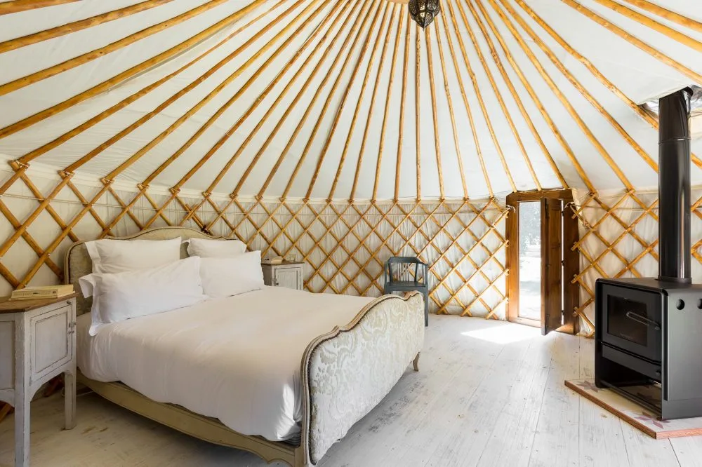 Yurt double bedroom with stove